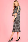 1279 Printed midi dress with ladder detailed 3/4 sleeves.