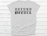 DEFUND THE MEDIA UNISEX T-SHIRTS