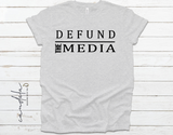DEFUND THE MEDIA UNISEX T-SHIRTS