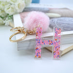 1PC Women Keychains  26 Glitter Hollowed-out  Words Handbag English Letter Keyring  with Puffer Ball Charms - ENSEIGNE DENIS