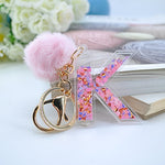 1PC Women Keychains  26 Glitter Hollowed-out  Words Handbag English Letter Keyring  with Puffer Ball Charms - ENSEIGNE DENIS