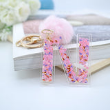1PC Women Keychains  26 Glitter Hollowed-out  Words Handbag English Letter Keyring  with Puffer Ball Charms - ENSEIGNE DENIS