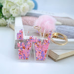1PC Women Keychains  26 Glitter Hollowed-out  Words Handbag English Letter Keyring  with Puffer Ball Charms - ENSEIGNE DENIS