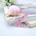 1PC Women Keychains  26 Glitter Hollowed-out  Words Handbag English Letter Keyring  with Puffer Ball Charms - ENSEIGNE DENIS